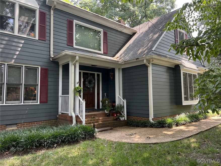 View of front property featuring covered porch