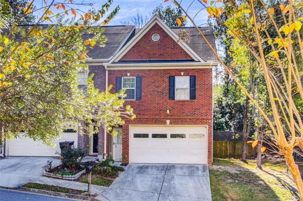 End Unit with side yard and a very private back co