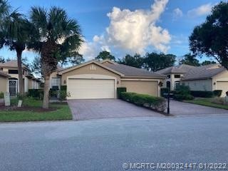 NICE WIDE DRIVEWAY,GARAGE DOOR OPENER, GENERATOR FOR THE HOME.  SIDE ENTRY DOOR. VIEW OF THE GOLF COURSE FROM THE SCREENED PATIO CBS BLOCK HOME.  PERFECT CONDITON. ENJOY THE COUNTRY CLUB, TENNIS , POOL, CLUBHOUSE AND MORE....