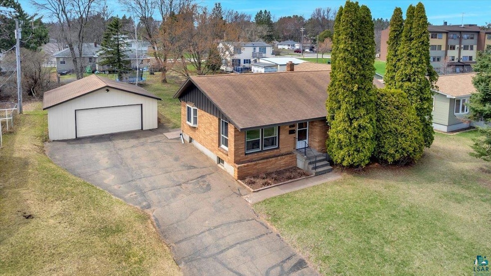 Solid Brick 1966 Single story home on a large lot with a 2 car garage, screenporch and a shed