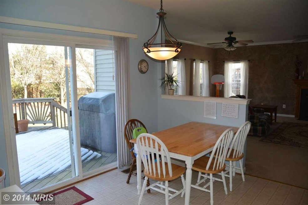 8873 Whitchurch Ct, Bristow, VA 20136 - photo 1
