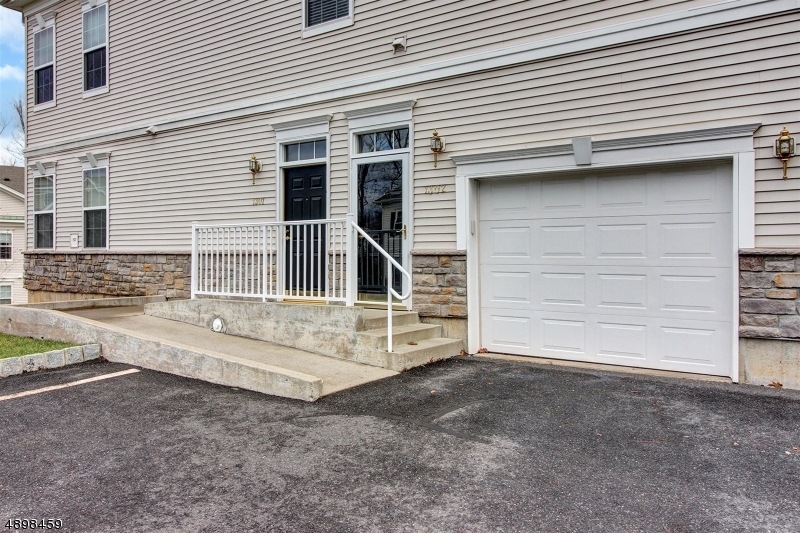 1302 Meadow Brook Ct unit 1302, Whippany, NJ 07981 - photo 1