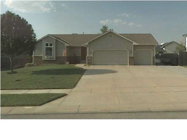 1606 E James. Front view with 3 car garage and ext