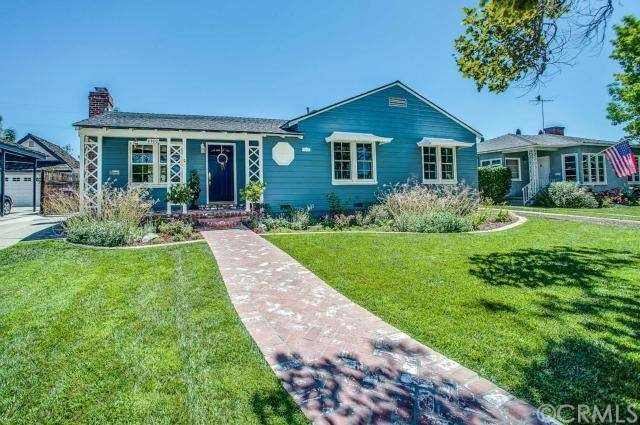 Situated on one of the prettiest streets in Long B