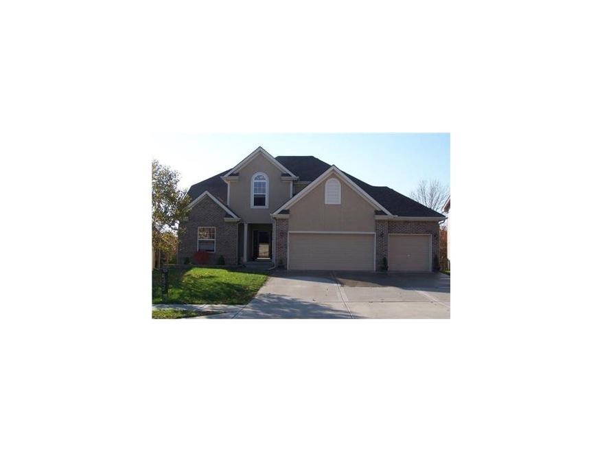 Spacious 1.5 story with brick accent,  3 car garag