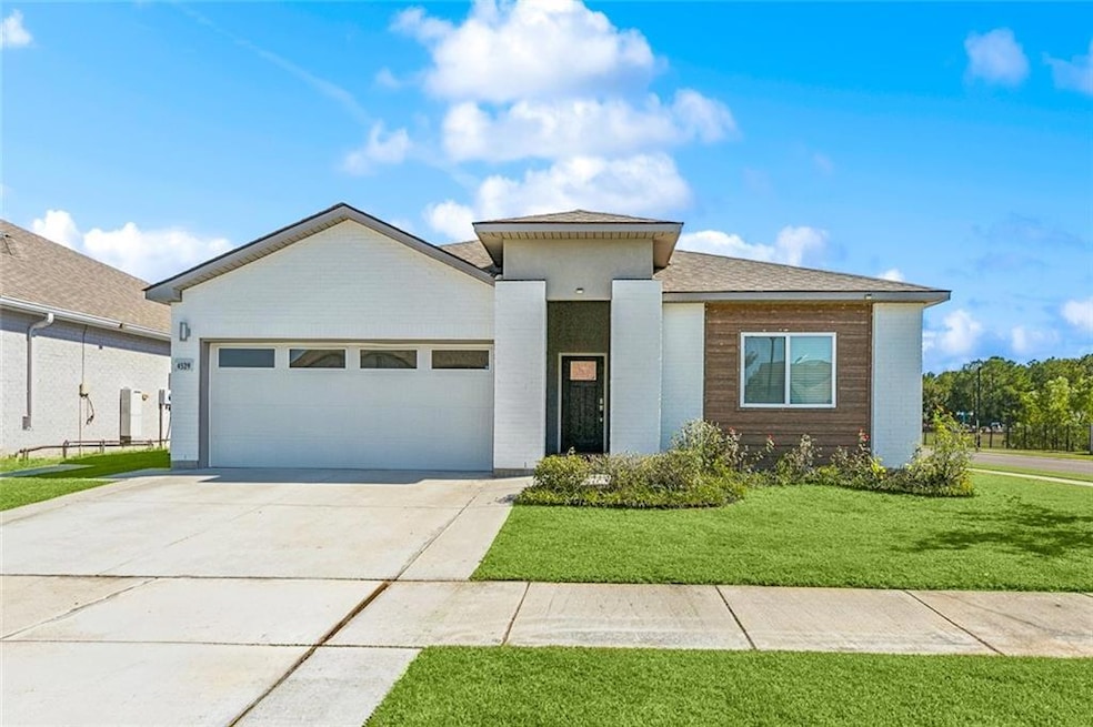 Welcome home! Modern curb appeal + fresh landscaping)
