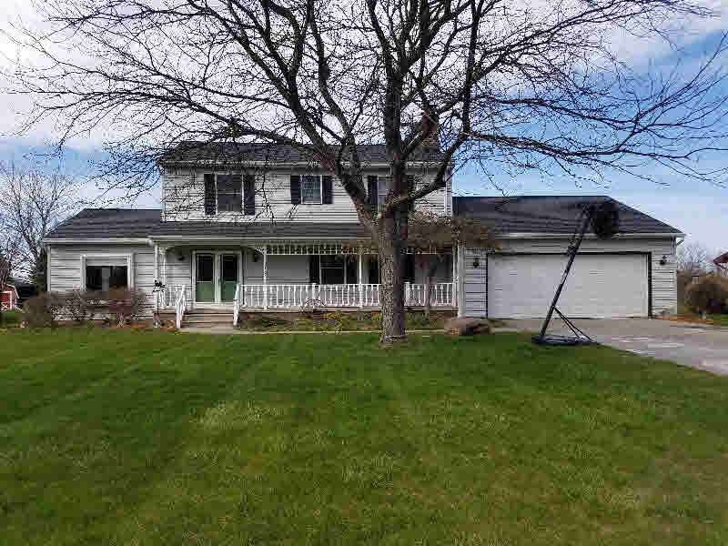 This 4 bedroom, 2 full and 2 half bath home, has a