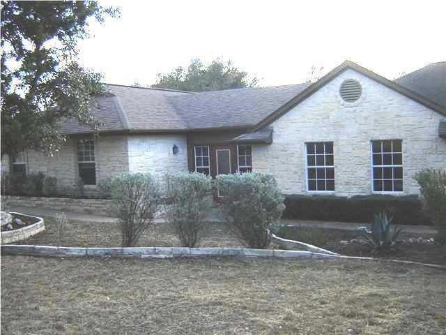 Exterior Front : Lovely limestone Texas country home