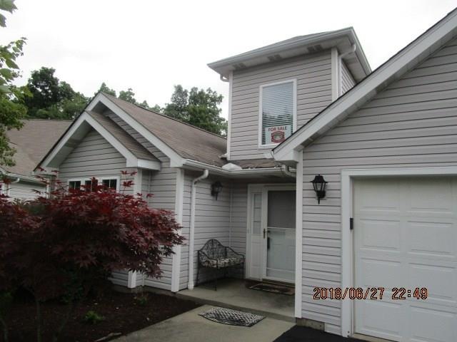 WELCOME TO 218 SADDLE COURT IN DANBURY FARMS!