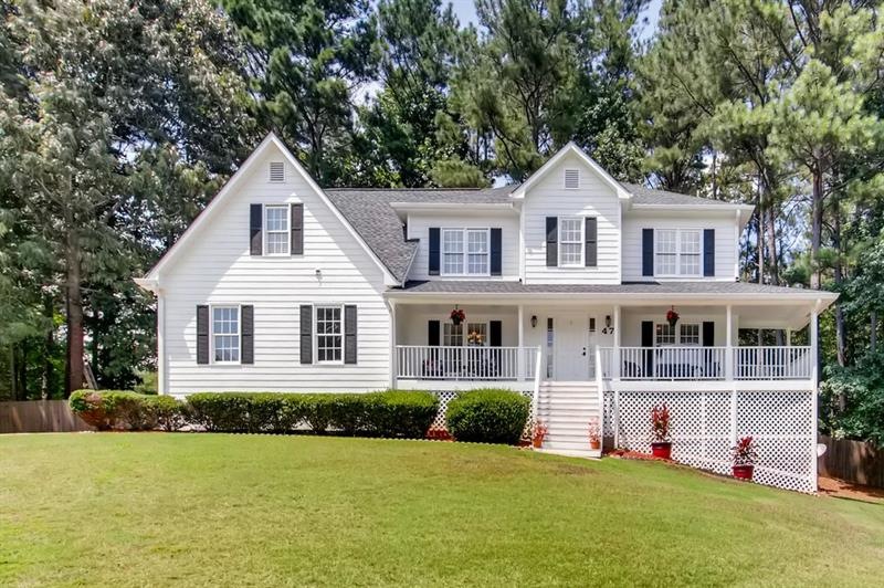 Beautiful Home with Wrap around  Front Porch, in a