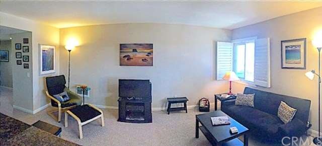 Living room with new carpet and plantation shutter