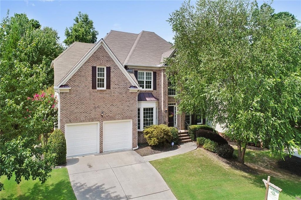 Beautiful brick front home in Hamilton Mill!