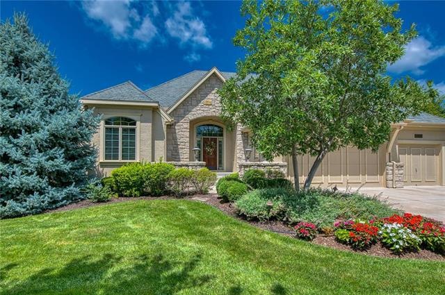 Front with beautiful landscaping