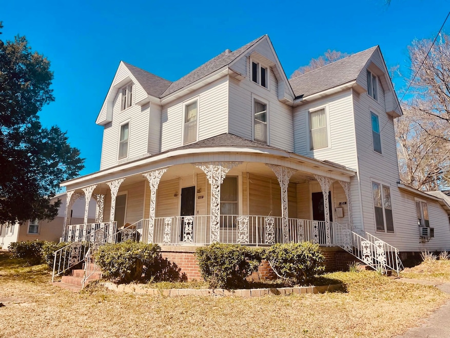 Welcoming porch with loads of historical charm