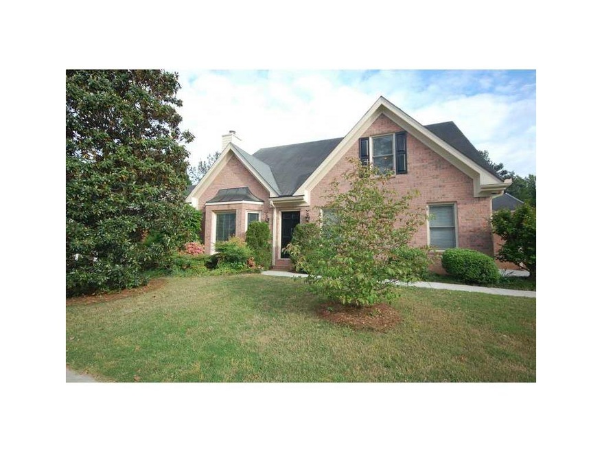 Exterior Front. 4-Sided Brick Lake Front Home w/Fr