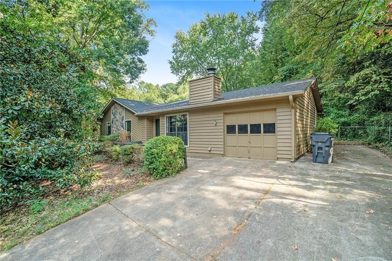 1031 Chisolm Way NW, Lilburn, GA 30047 - photo 1