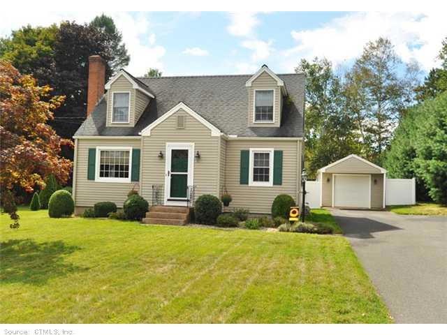 Exterior Front. Newer siding and windows, driveway