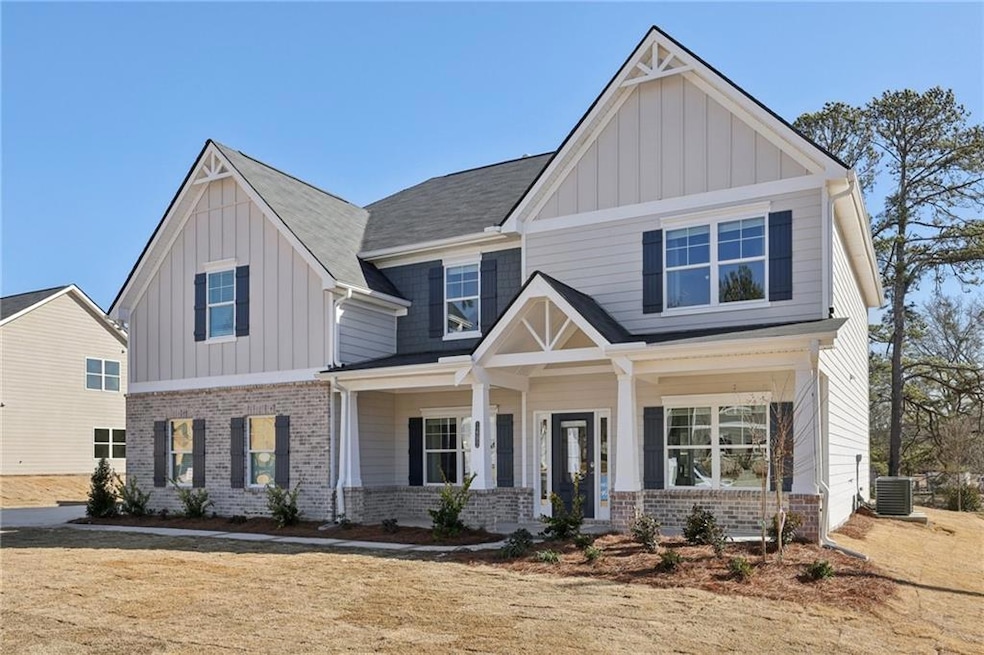 Craftsman-style house with board and batten siding