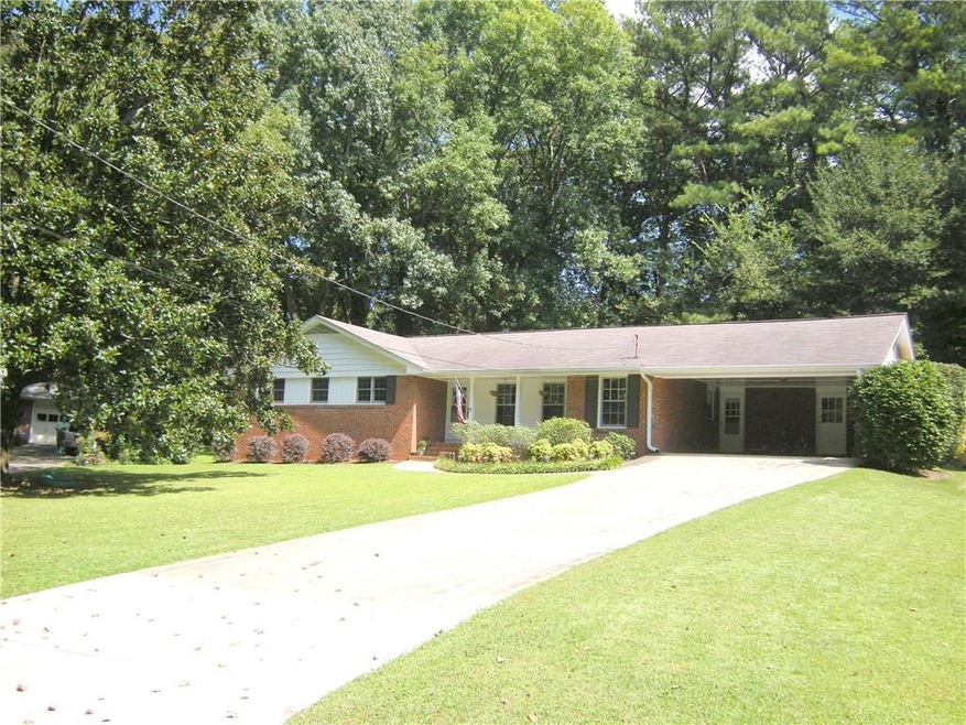 This 4-Sided Brick Ranch sits in a cul-de-sac on a