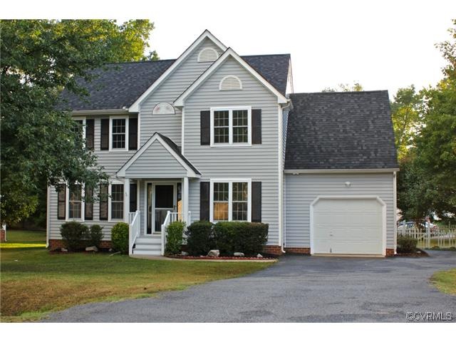 Beautiful two story transitional home with a one c