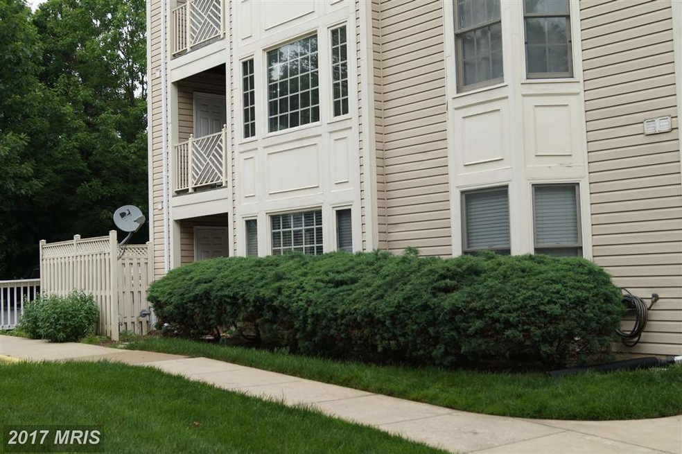 12225 Fairfield Hse Dr unit 100C, Fairfax, VA 22033 - photo 1