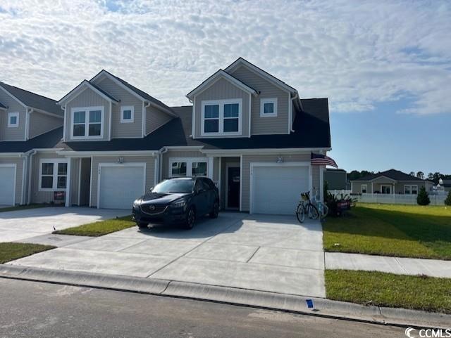 View of front of home with a garage