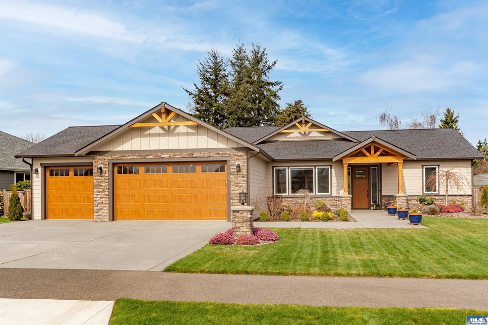 Quality craftmanship reigns throughout this beautiful Sequim home.