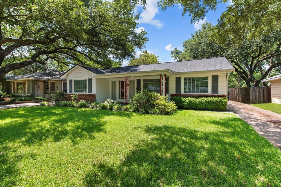 Ranch-style home featuring a front yard