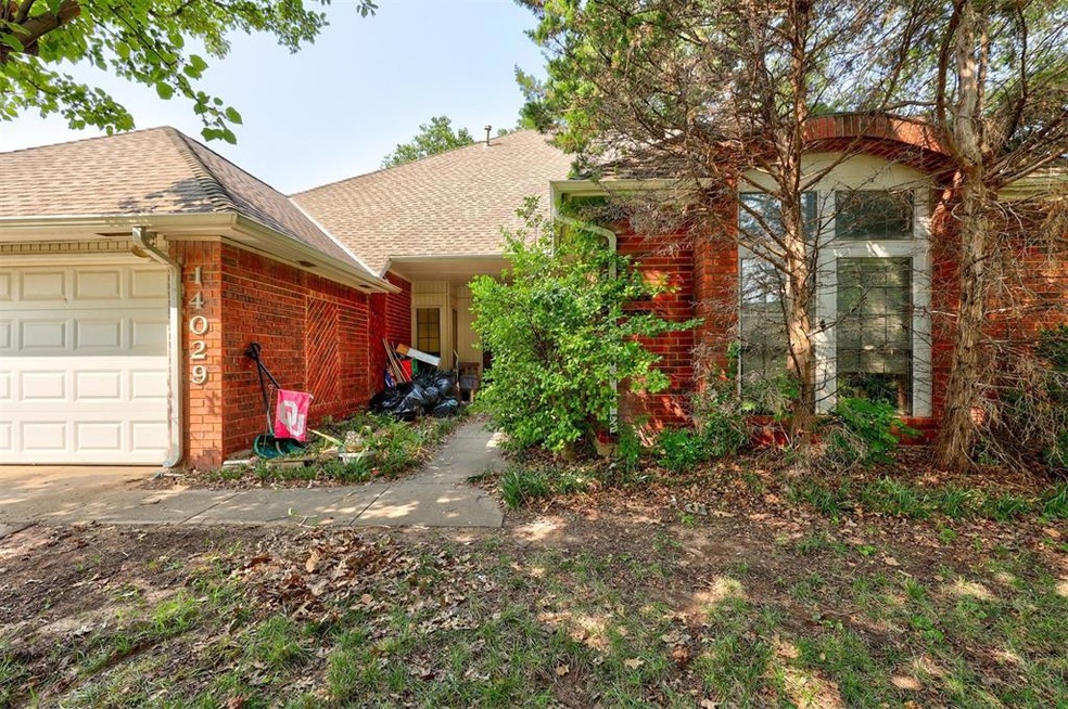 View of side of home featuring a garage