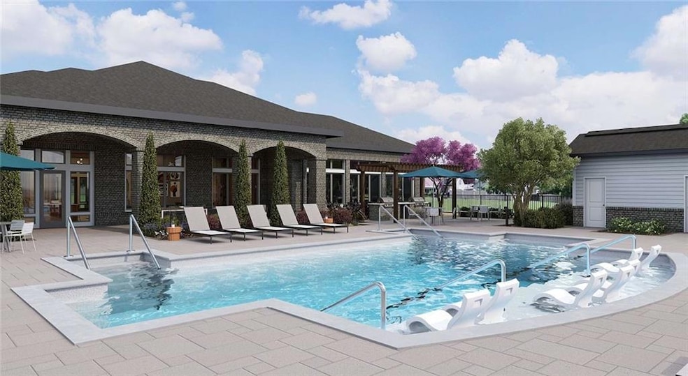 Community pool with a patio