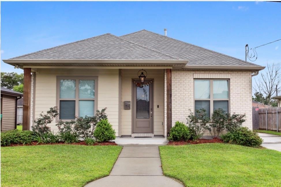 Traditional style home with beautiful landscaping!