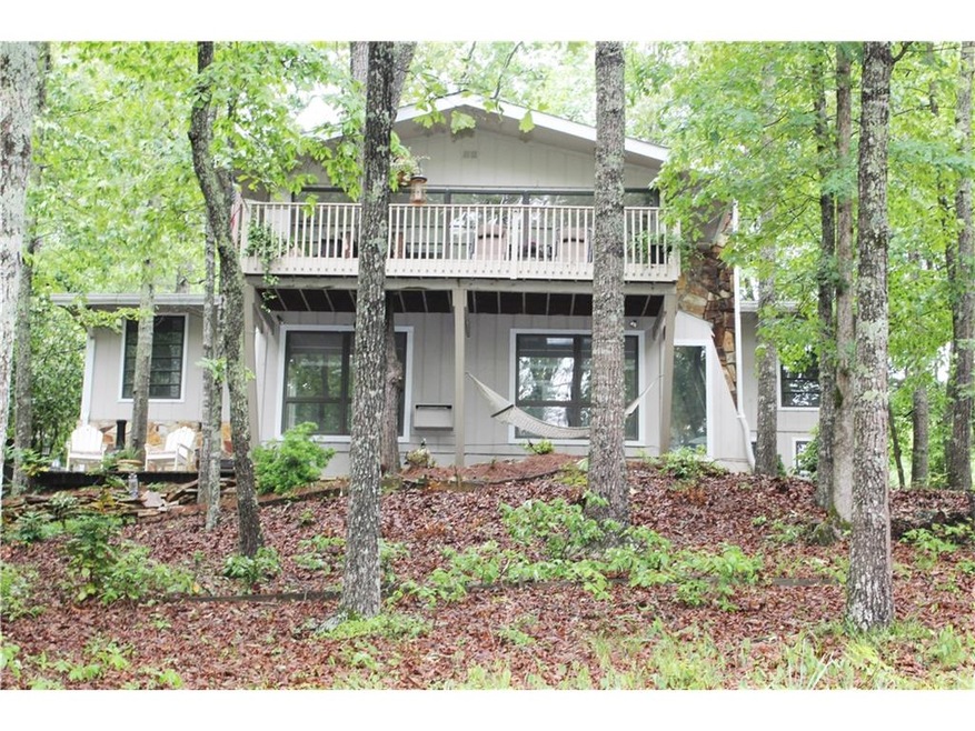 Lake Cottage Sits on Wooded Lot w/Lake View
