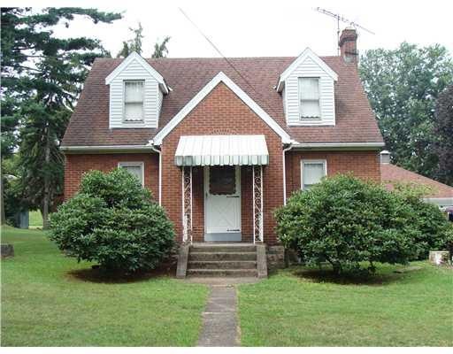 Exterior Front. Front view of home, front door wit