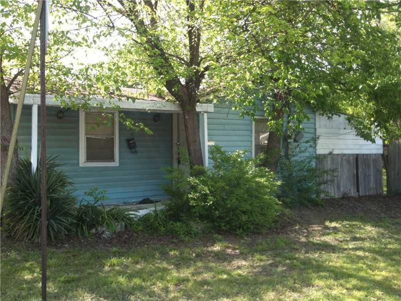 Exterior Front. Property is to be entered at your own risk.  It is a tear down.  Value is in lot.