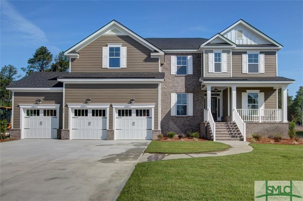 EXTERIOR FRON WITH RAISED ELIVATION, 3 CAR GARAGE,