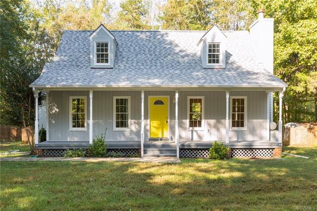 Charming cape with covered country front porch, bo