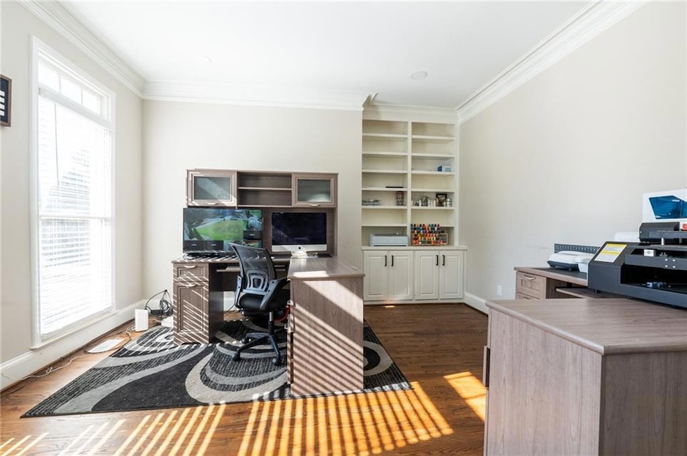Office featuring dark hardwood / wood-style floors