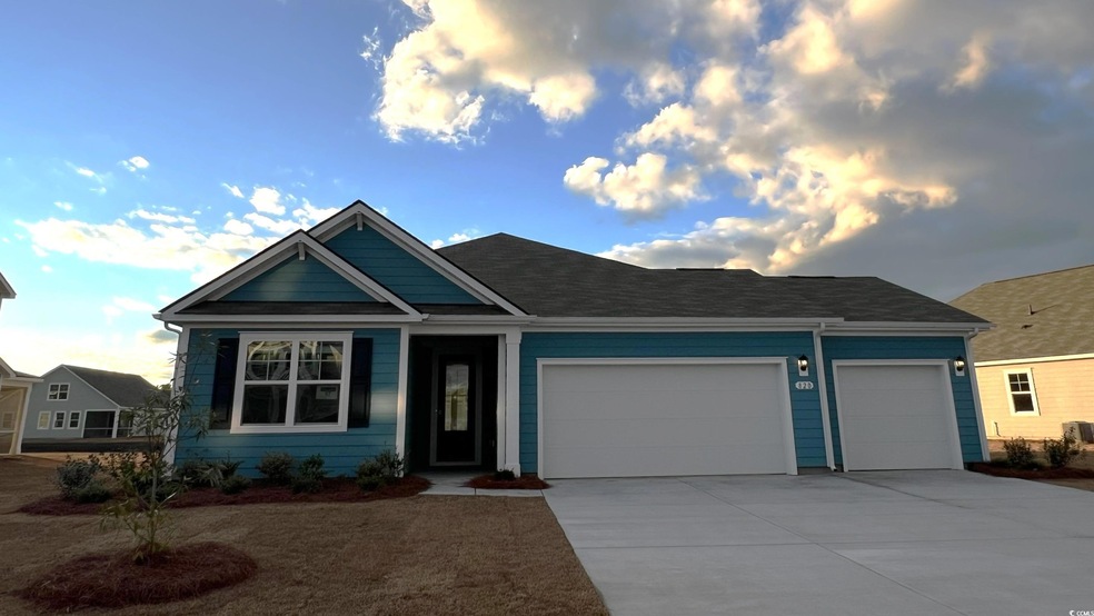 View of front facade with a garage