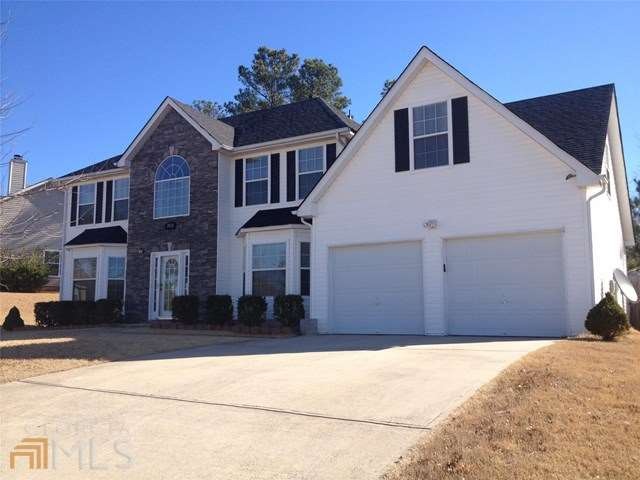 Exterior, angled front view of home. This 5BR/3BA 