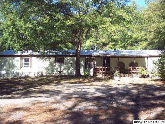 Large front yard, a circular drive.