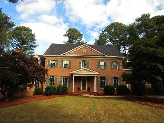 Exterior Front. Grand 4 side brick home on estate 