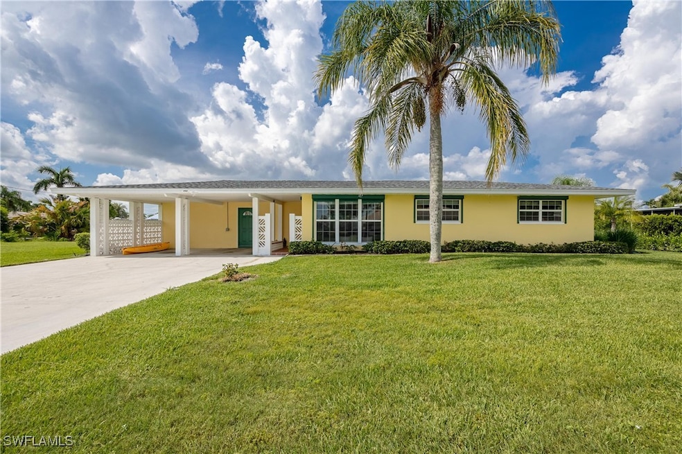 View of front of house featuring a front yard and
