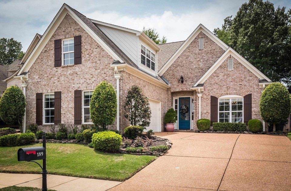 This house is on a beautiful lot with the wooded w