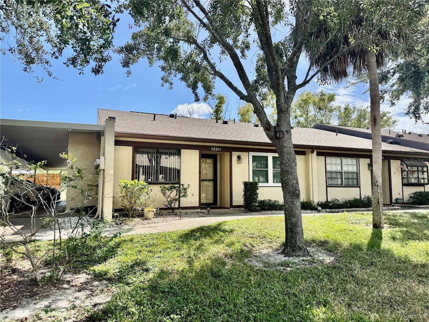11231 Dollar Lake Dr unit 1, Port Richey, FL 34668 - photo 1
