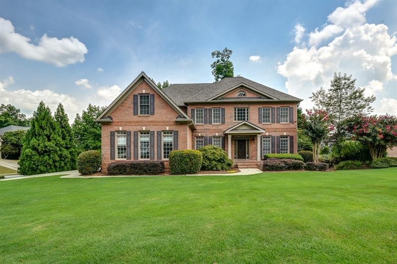 This is It! Welcome to this 3 Sided Brick Home wit
