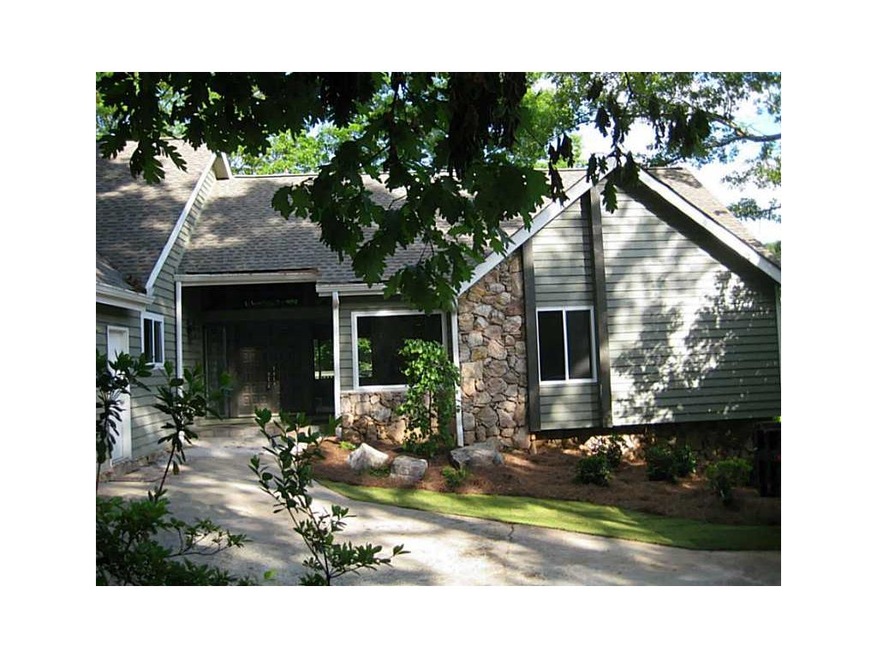 Exterior Front. Cottage-Style Home with Natural Ro
