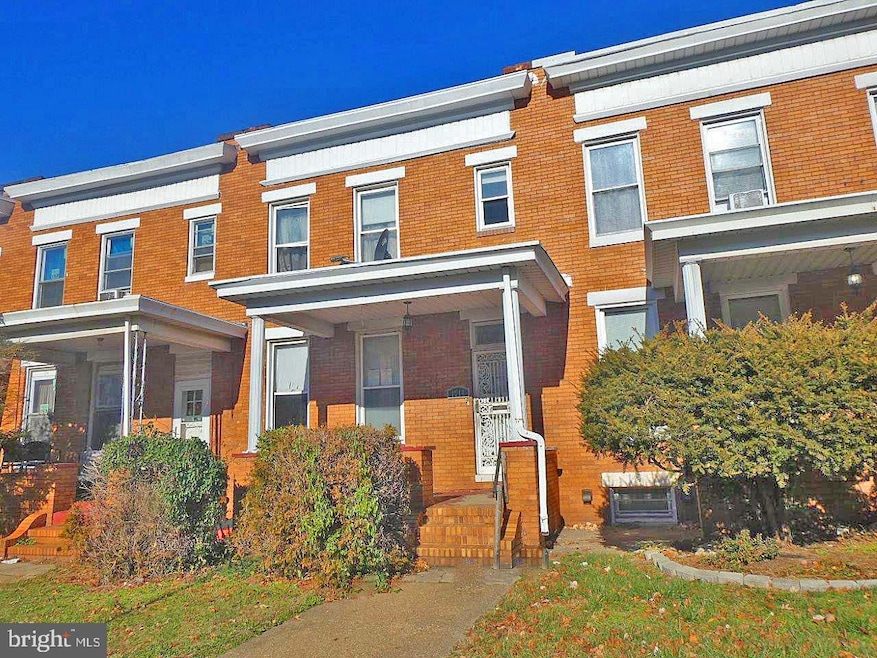 1718 E 32nd St, Baltimore, MD 21218 - photo 1