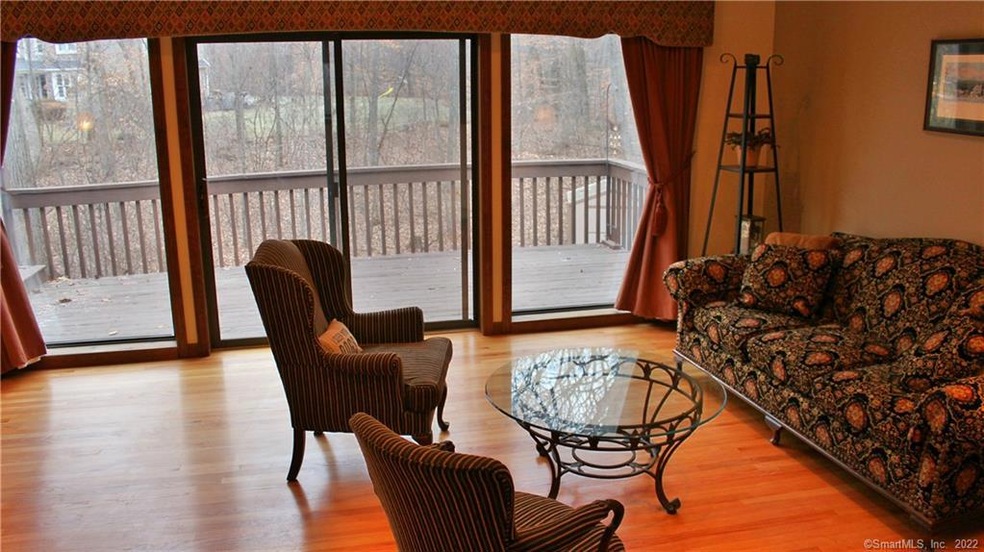Living room with view of deck