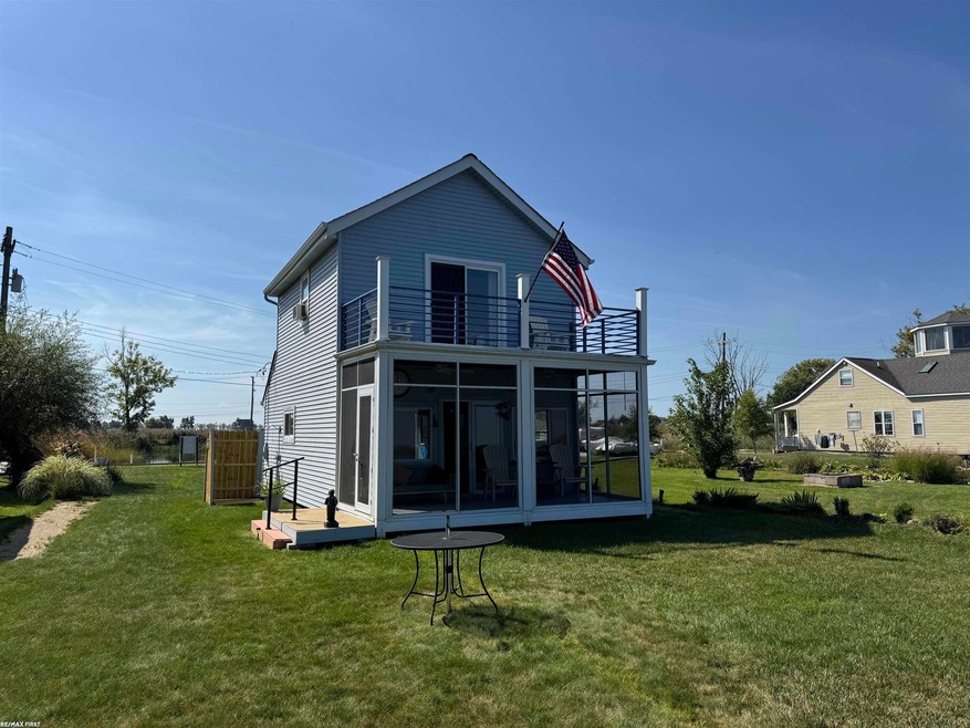 7286 S Channel Dr, Harsens Island, MI 48028 - photo 1