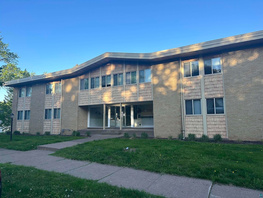 View of front of property with a front lawn